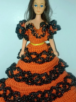 Old doll like new with vintage knitted dress