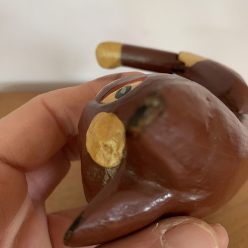 Wooden sitting cat with movable arms, like new, ~20 cm