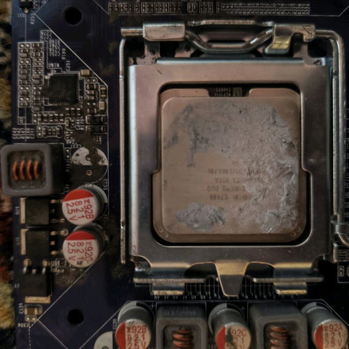 Motherboard with Intel Duo Core E7400 CPU, 4GB RAM and stock cooler used
