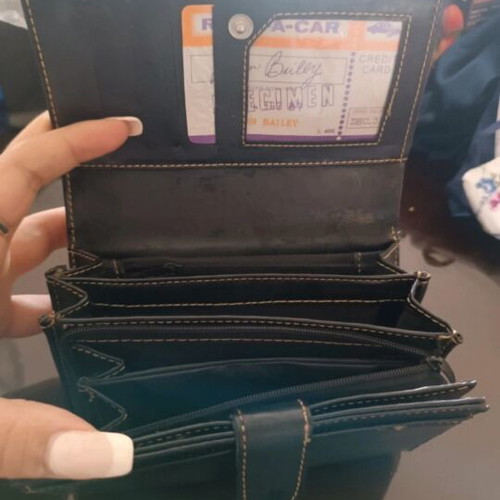 Vintage black leather wallet used with embroidery and multiple compartments