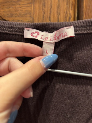 Brown top with embroidered details like new