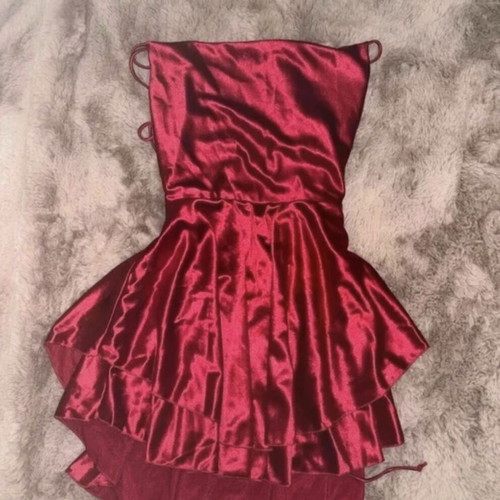 Red satin mini dress, adjustable straps, silky texture