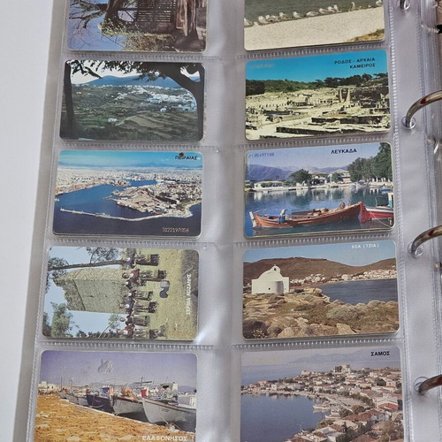 Phone cards used, album with 560 pieces