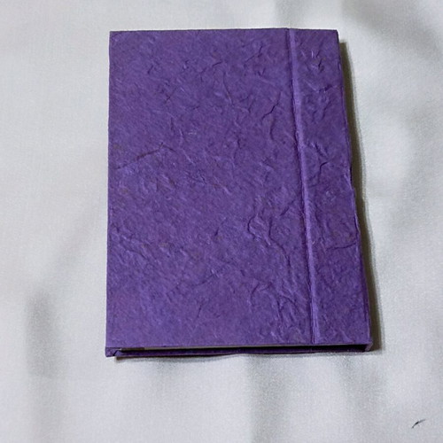 Decorative notepad with index used, purple, natural paper