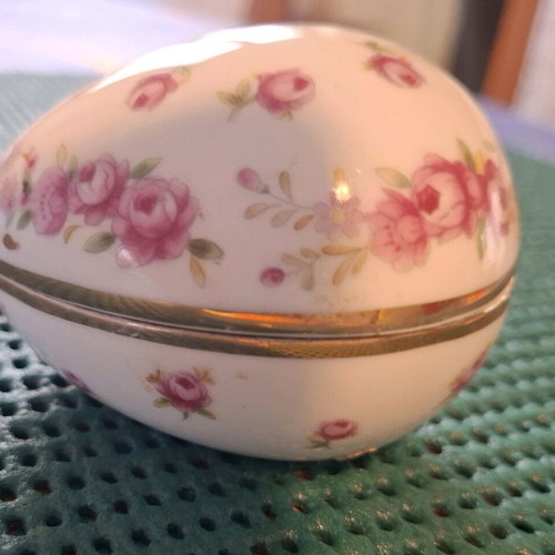 Porcelain decorative container used, small egg with pink flowers
