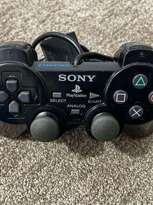 Sony PS2 controller used, non-working for repair or parts