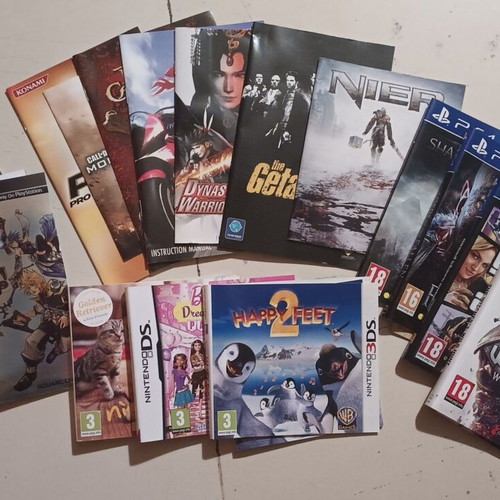 Bundle of manuals and covers for PS4, PS3, PSP, DS & 3DS, like new