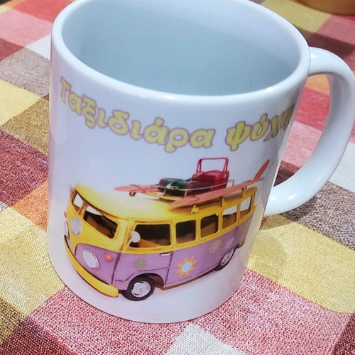 Coffee mugs used, set of 4 with designs and Nava brand