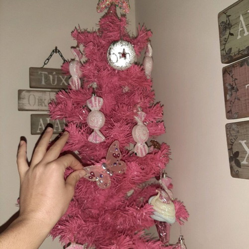 Small Christmas tree with ornaments like new