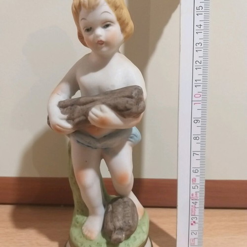 Porcelain figurine of a child vintage, like new