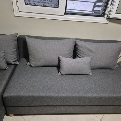 Corner sofa bed with storage, used