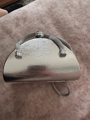Evening bag like new, metallic handheld
