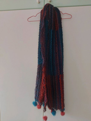 Multicolored scarf like new with ball designs at the bottom