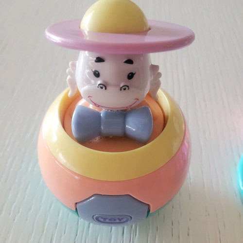Baby toys ball and horn like new in pastel colors
