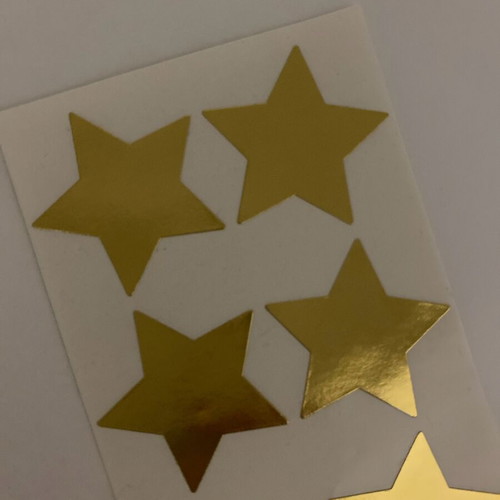 Gold star stickers like new