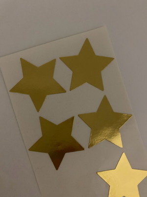Gold star stickers like new