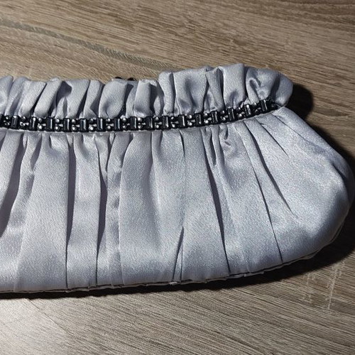 Satin silver bag used with stones and chain