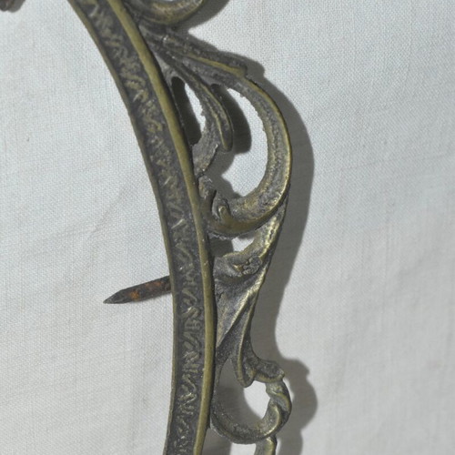 Brass oval frame used with embossed vintage design