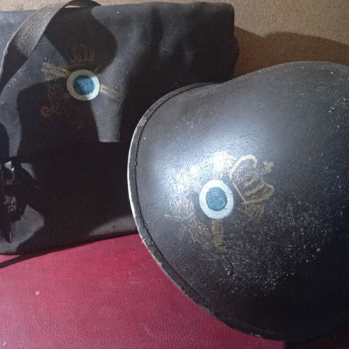Military bag and helmet used, officer rank