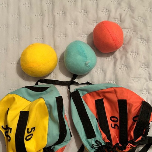 Bocce Ball game like new with three balls and two head cases