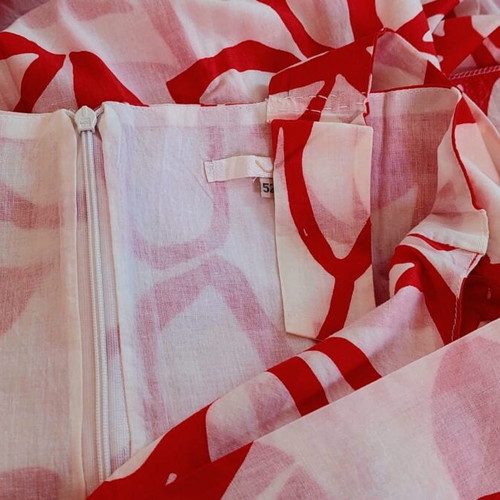 Summer dress with floral pattern and side tie