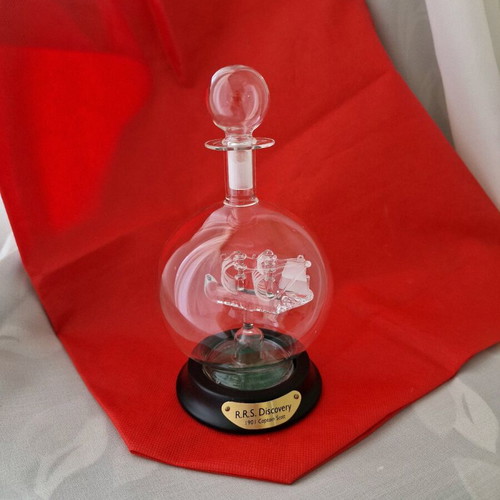 Glass ship in blown glass bottle like new