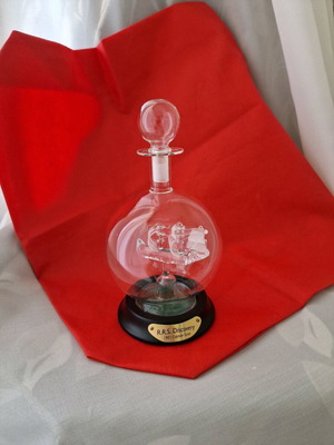 Glass ship in blown glass bottle like new