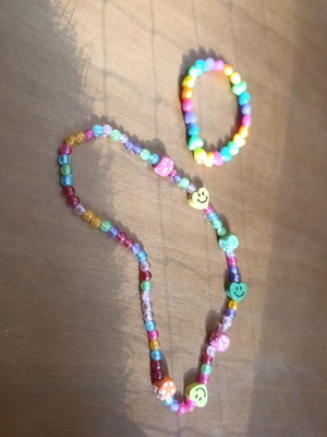 Children's jewelry set used, necklace and bracelet with hearts, multicolor