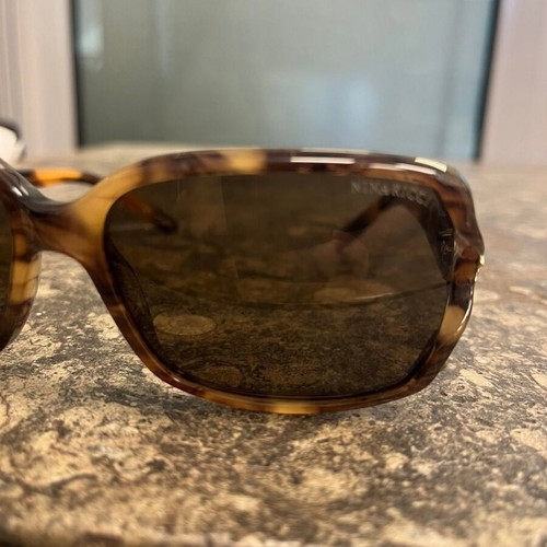 Nina Ricci women's sunglasses, black and brown