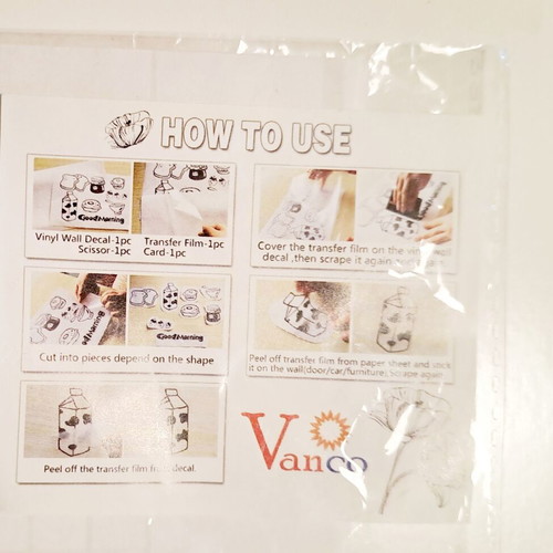 Bathroom accessory set like new with ceramic items and wall sticker