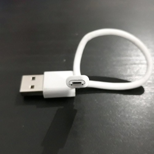 USB charger cable used, white color
