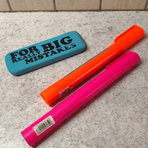 Office supplies set with 2 highlighters and an eraser like new