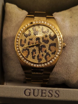 Guess women's watch used, gold with leather detail and solid links