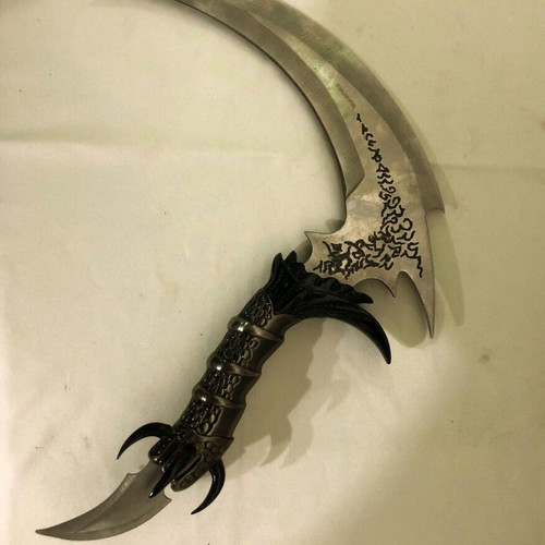 Decorative stainless steel knife with stand like new