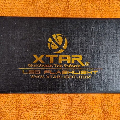 Xtarlight Metal LED Pocket Flashlight like new with clip