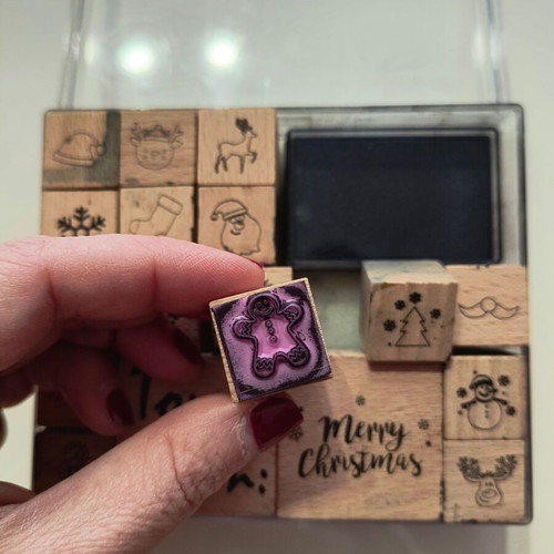 Craft set with wooden Christmas stamps used