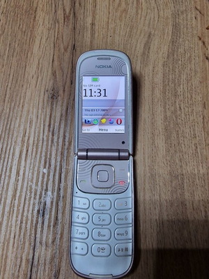 Nokia 3710a pink phone with battery and charger