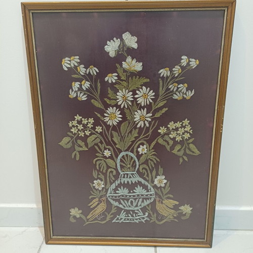 Embroidered textile painting used with silver and gold thread on velvet