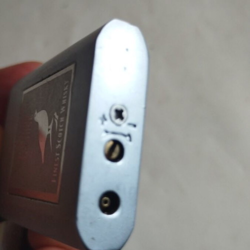 Famous Grouse lighter used, no gas
