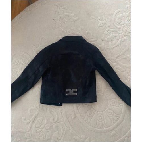 Short black reversible jacket with faux fur cuffs