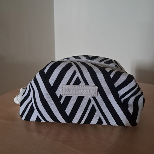 Neutrogena toiletry bag, black and white