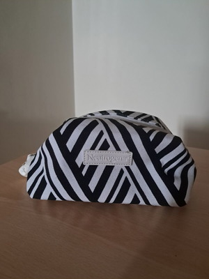 Neutrogena toiletry bag, black and white
