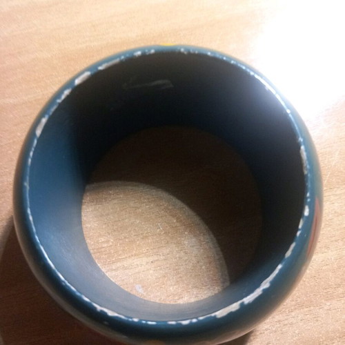 Wooden bracelet used with painted design