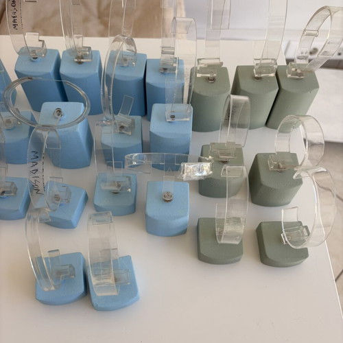 Wooden watch display stands used, set of 42 pieces with plastic clips