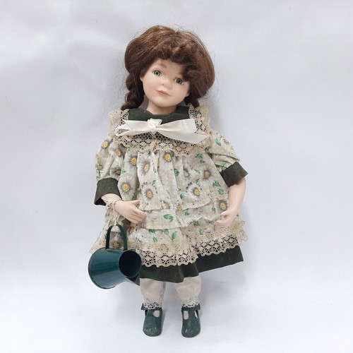 Vintage gardener doll with original outfit and watering can
