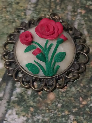 Handmade rose pendant with bronze frame