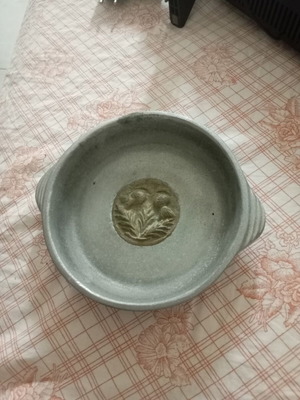 Metal bowl with decorative elements