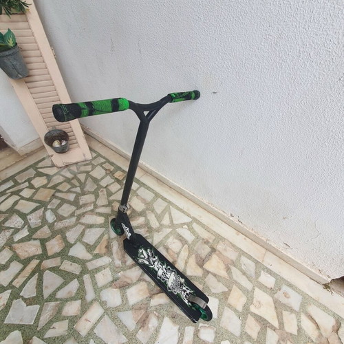Stunt scooter used for tricks