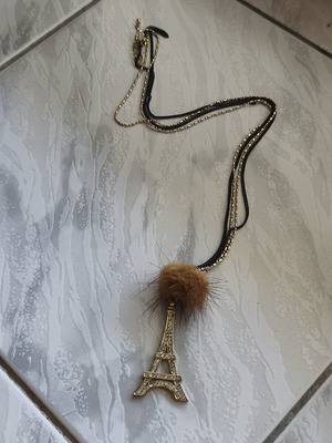 Necklace with Eiffel Tower and decorative fur pompom like new, black and gold