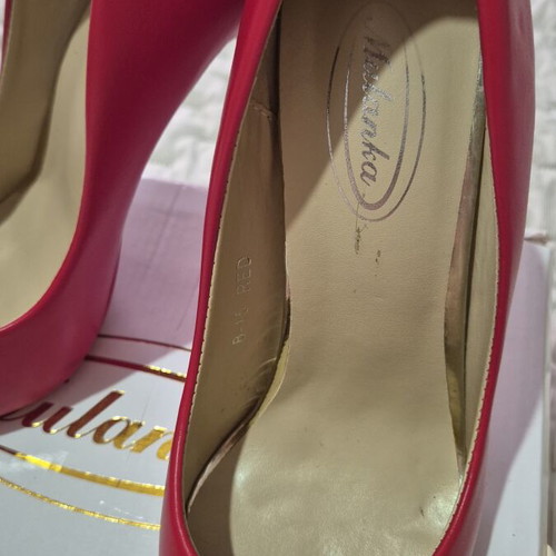 Red high heel pumps